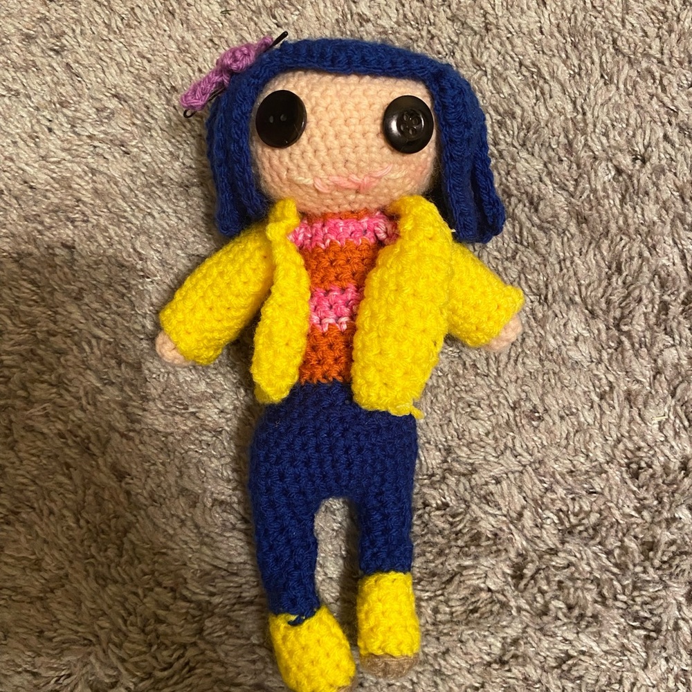 - Coraline doll